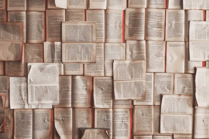 Stacked pages and printed articles representing Bruce Rosenstein’s published writings